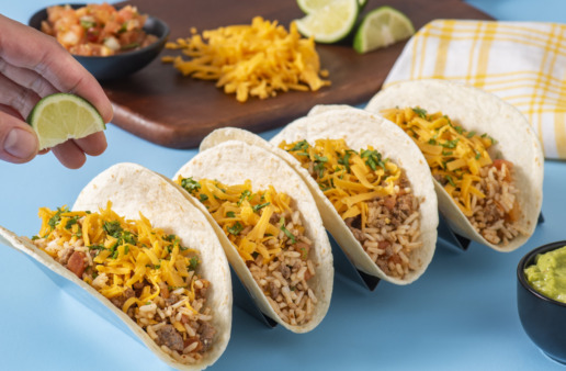 Beef and rice soft tacos with toppings