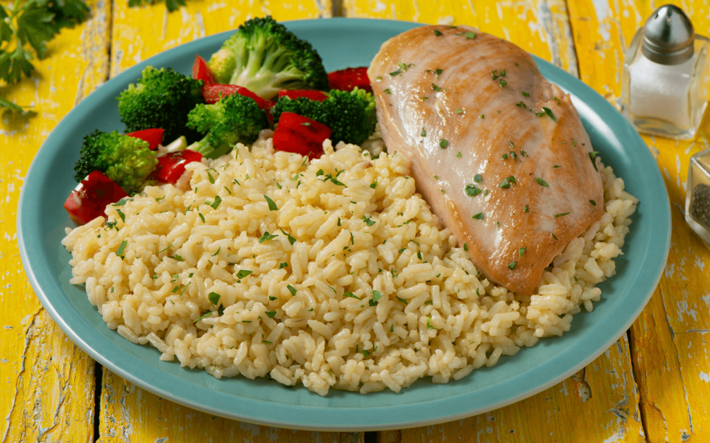 chicken breast and rice dinner with vegetables