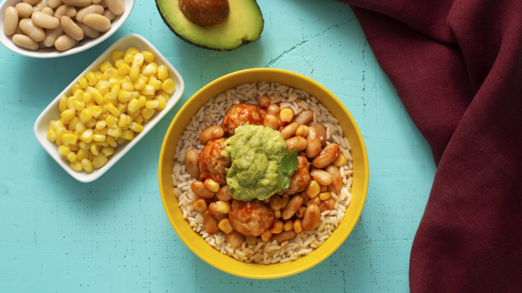 chili-bowl-with-white-beans-white-rice-and-turkey-meatballs-topped-with-guacamole