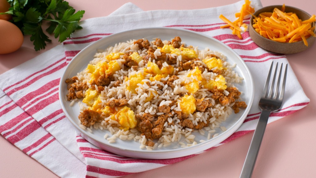 scrambled-eggs-with-cheese-and-sausage-served-over-white-rice